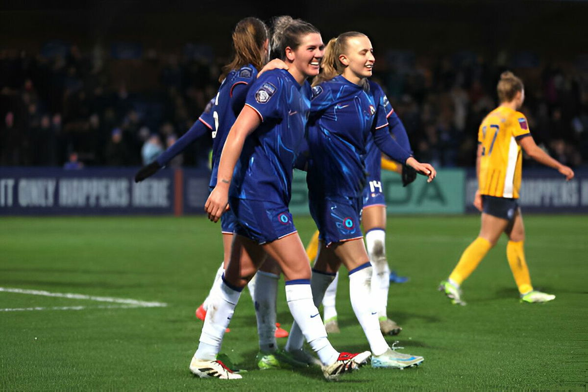 Chelsea's Sjoeke Nusken (left) celebrates scoring their side's fourth goal of the game with team-mates during the Barclays Women's Super League match at Kingsmeadow, Kingston upon Thames