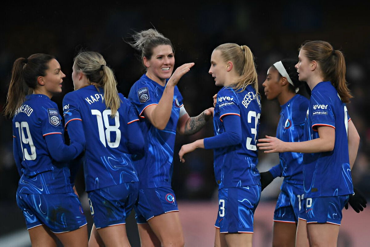 Aggie Beever-Jones of Chelsea celebrates with teammates after scoring her team's second goal during the Barclays Women's Super League match between Chelsea and Brighton & Hove Albion at Kingsmeadow on December 08, 2024 in Kingston upon Thames, England.