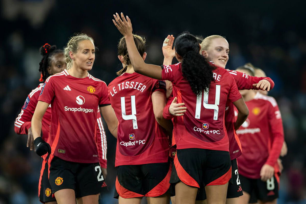 Manchester United players celebrate at full time during the Barclays FA Women's Super League match between Manchester City and Manchester United at the Etihad Stadium in Manchester, England, on January 19, 2025.