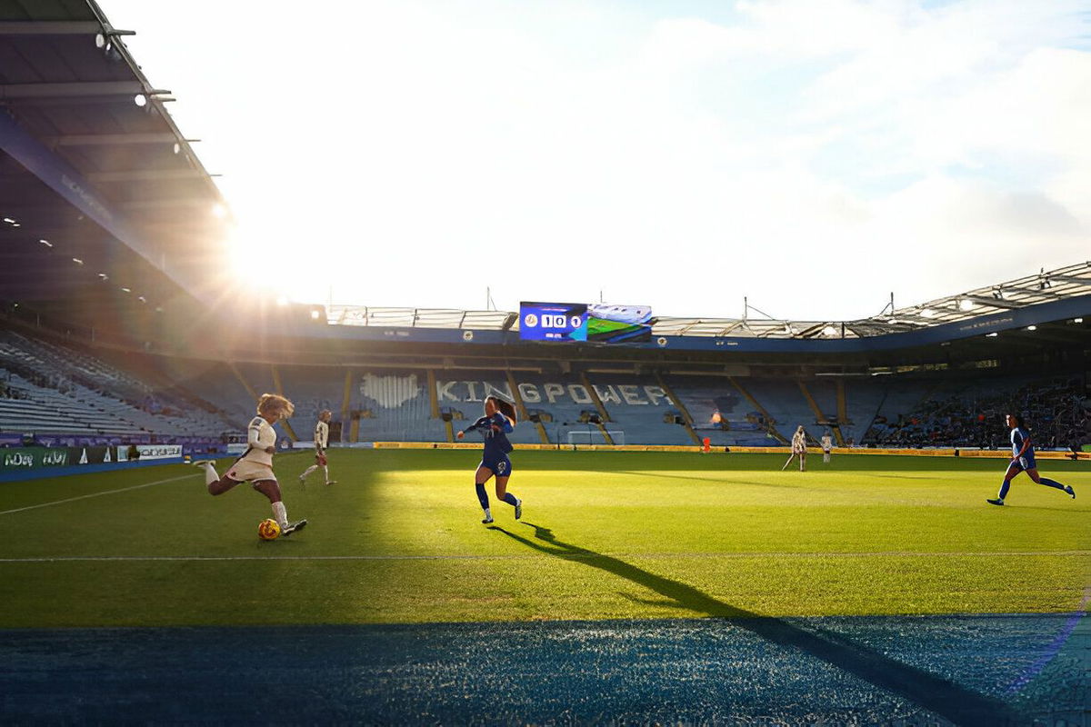 A general view of King Power Stadium as Ashley Lawrence of Chelsea crosses under pressure from from Missy Goodwin of Leicester City during the Barclays Women's Super League match between Leicester City and Chelsea at The King Power Stadium on December 14, 2024 in Leicester, England.