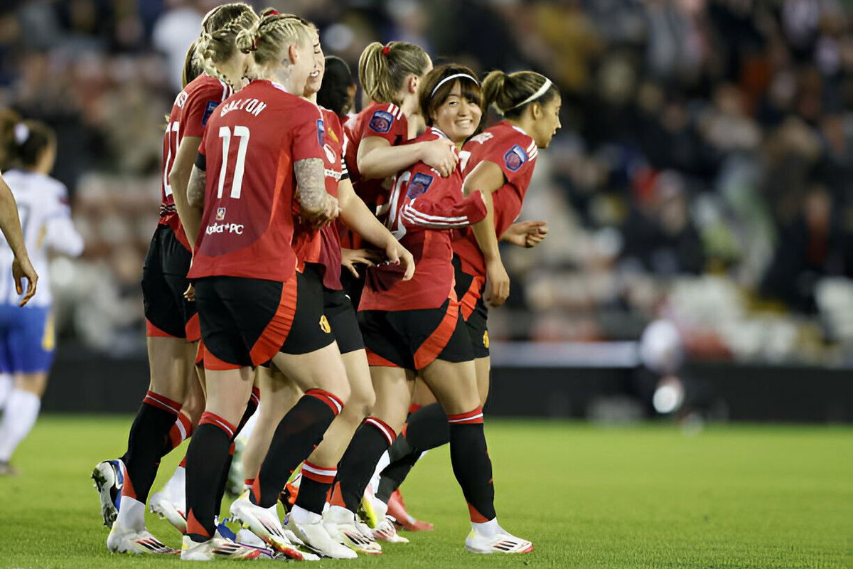 Manchester United women's Hinata Miyazawa (right) celebrates after scoring with Manchester United team during the Barclays Women's Super League match at Leigh Sports Village. Picture date: Sunday January 26, 2025.