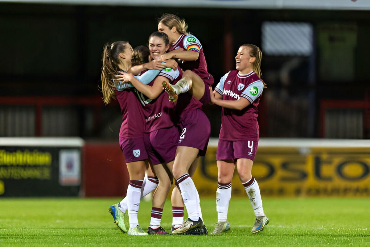 Anouk Denton of West Ham United celebrates with teammates after scoring to make it 4-2 during the Barclays Women's Super League match between West Ham United and Crystal Palace at Chigwell Construction Stadium on December 08, 2024 in Dagenham, England.